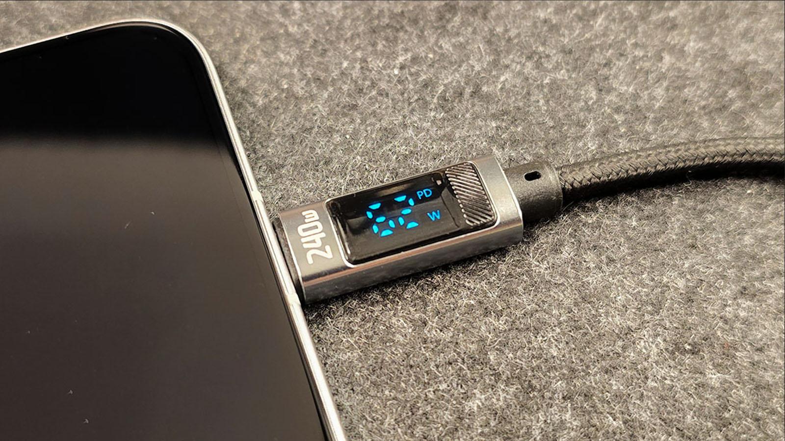 USB-C cable with watt display showing real charging speed